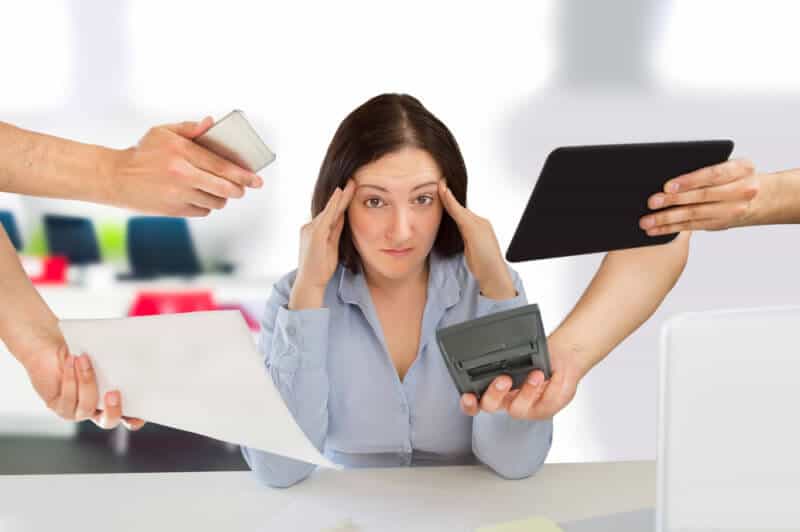 example of stock image from DepositPhotos - overwhelmed woman