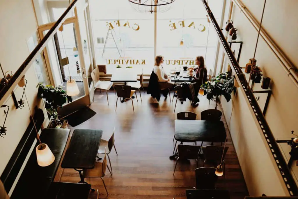 two people having a referral meeting in a coffee shop