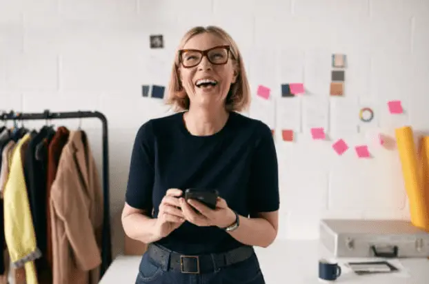 business woman engaging with customers over a mobile app