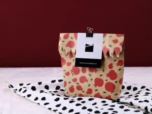 red and white polka dot paper bag - swag bag ideas