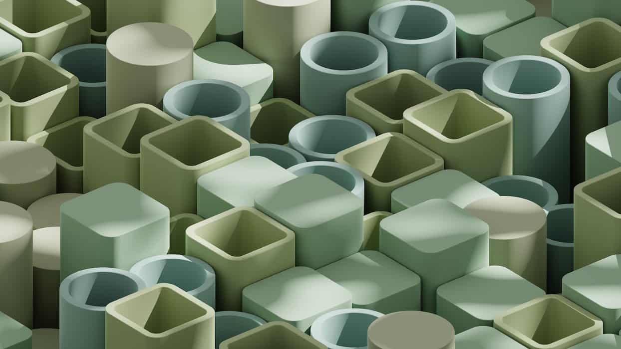 a lot of green and white vases stacked on top of each other