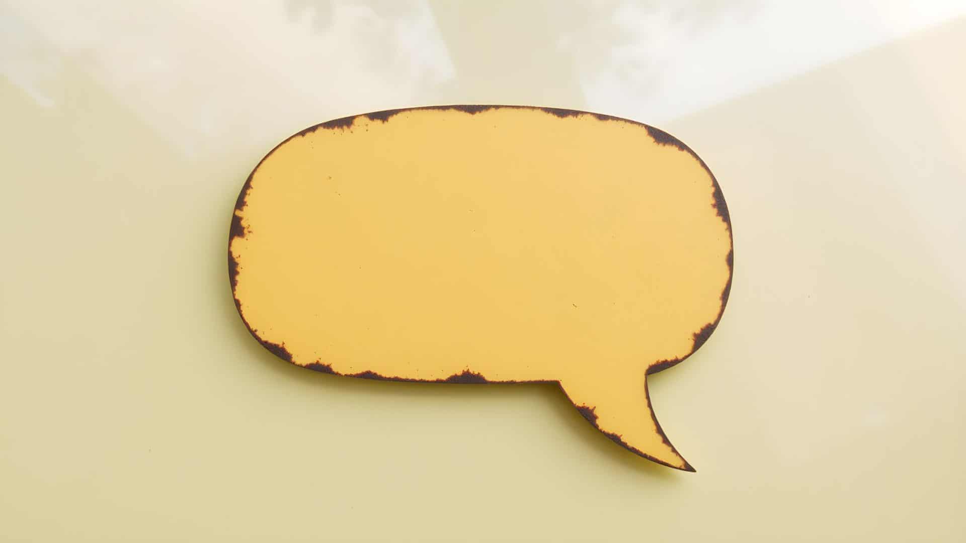 Small Business PR Strategy Yellow speech bubble on light background