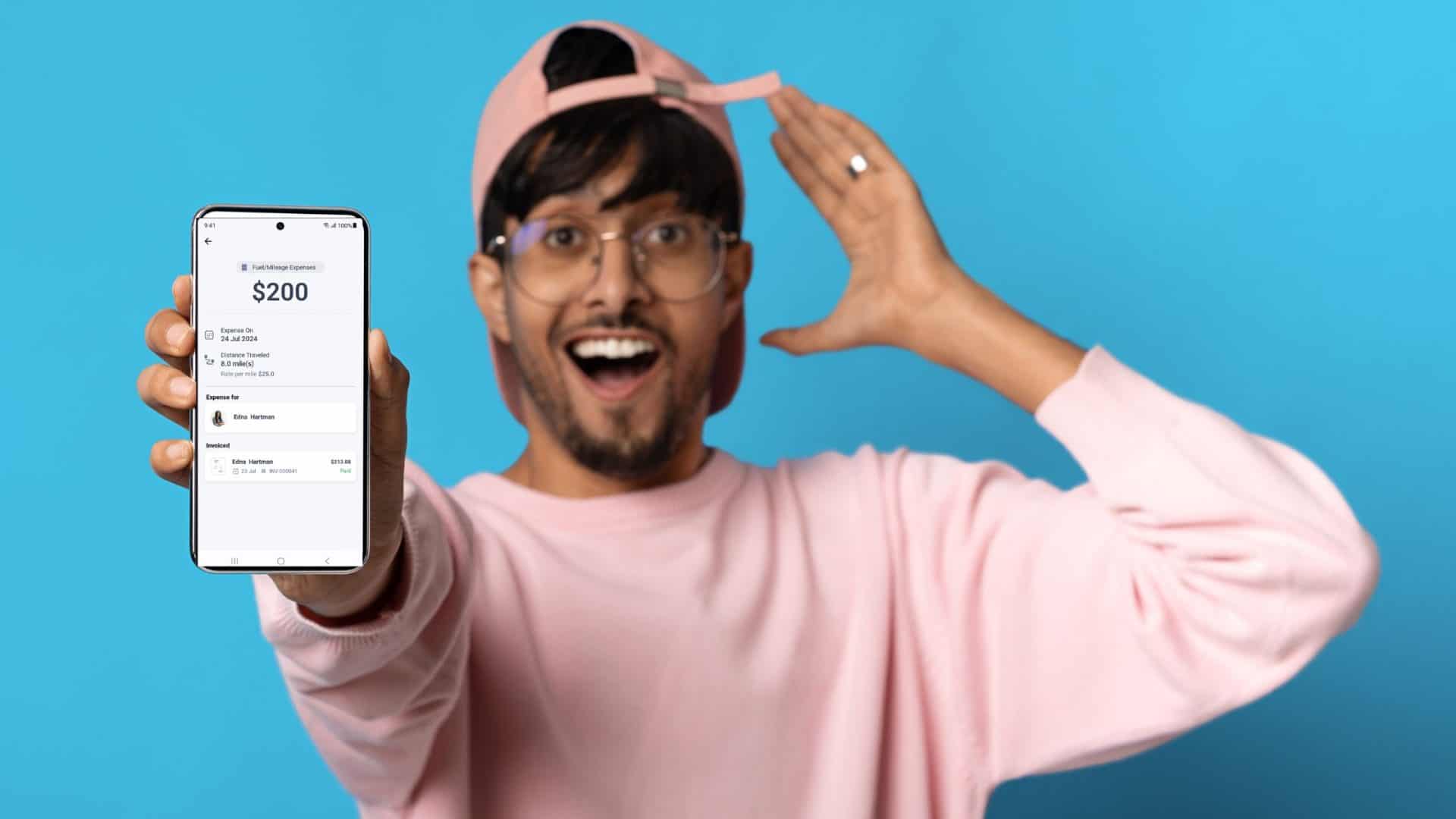 zoho for solopreneurs - young man holding zoho solo app on mobile phone