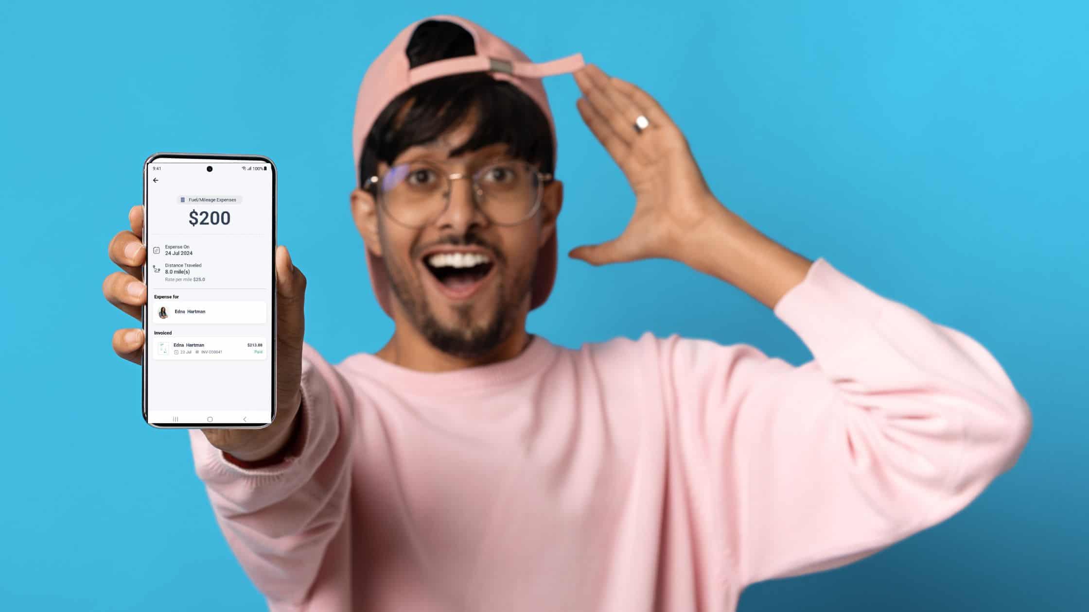 zoho for solopreneurs - young man holding zoho solo app on mobile phone
