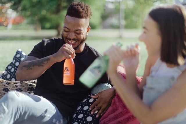 couple drinking soda