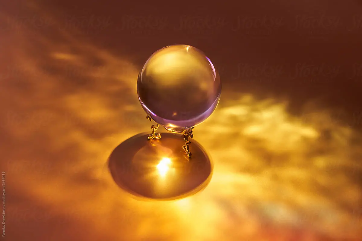 future search - crystal ball on gold background