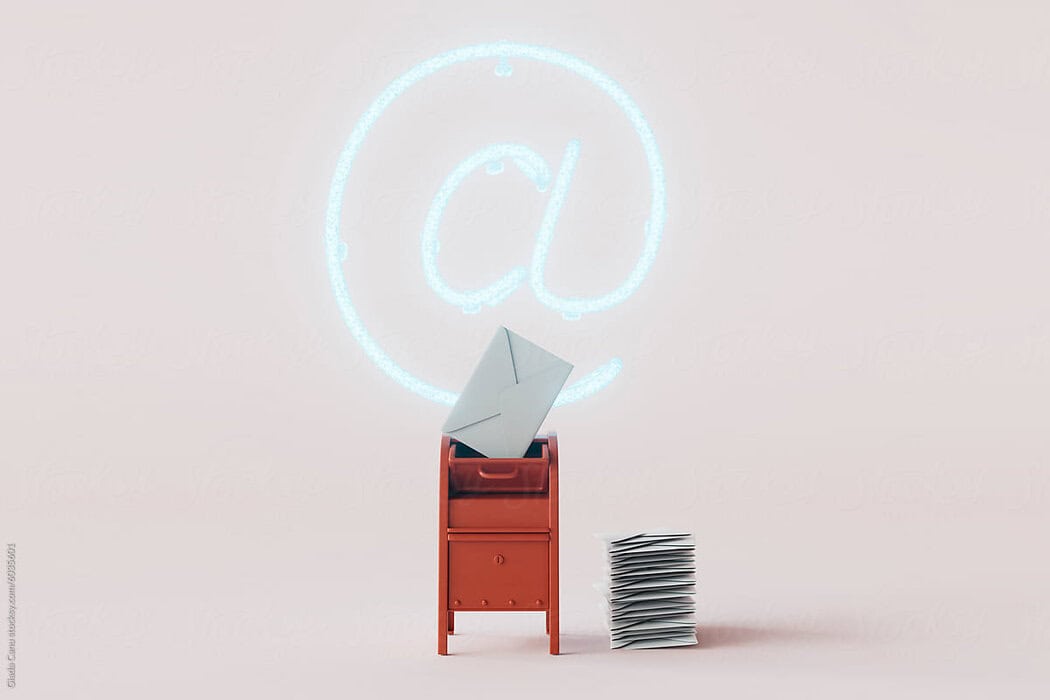 3D render of a red mailbox with one envelope partially out, a stack of envelopes beside it, against a light pink background with a neon blue at-symbol overhead.