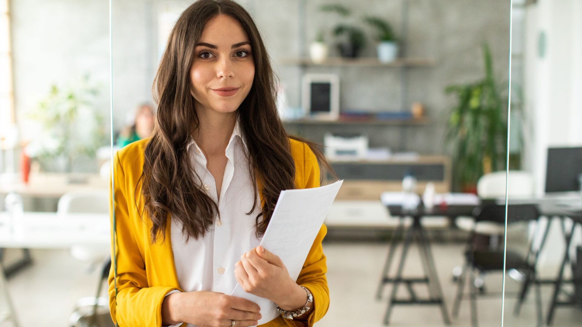 female employee in red sweater