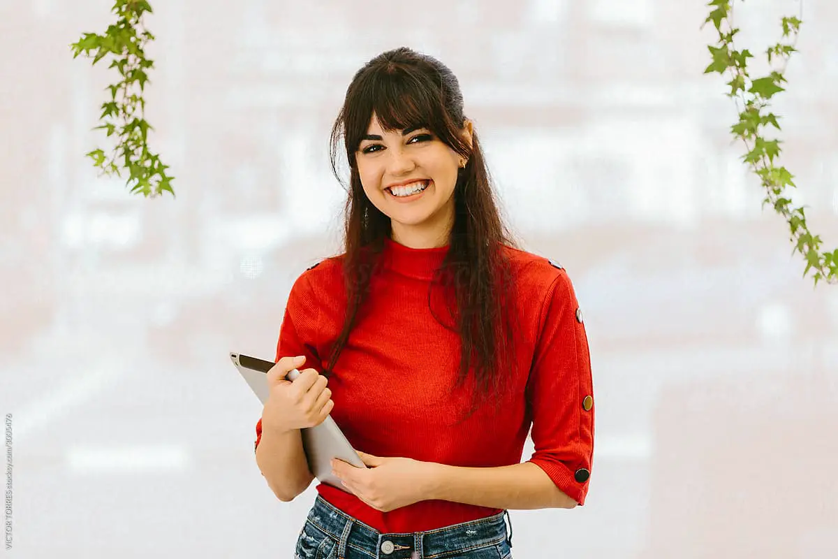 female employee in red sweater