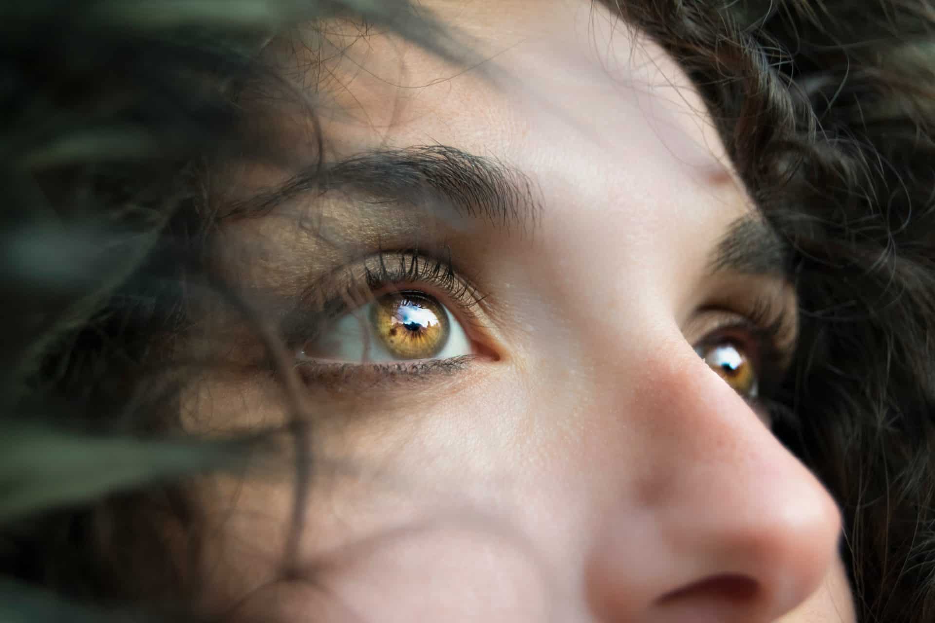 ways to find your ideal customer - see things through their eyes - woman looking into the distance