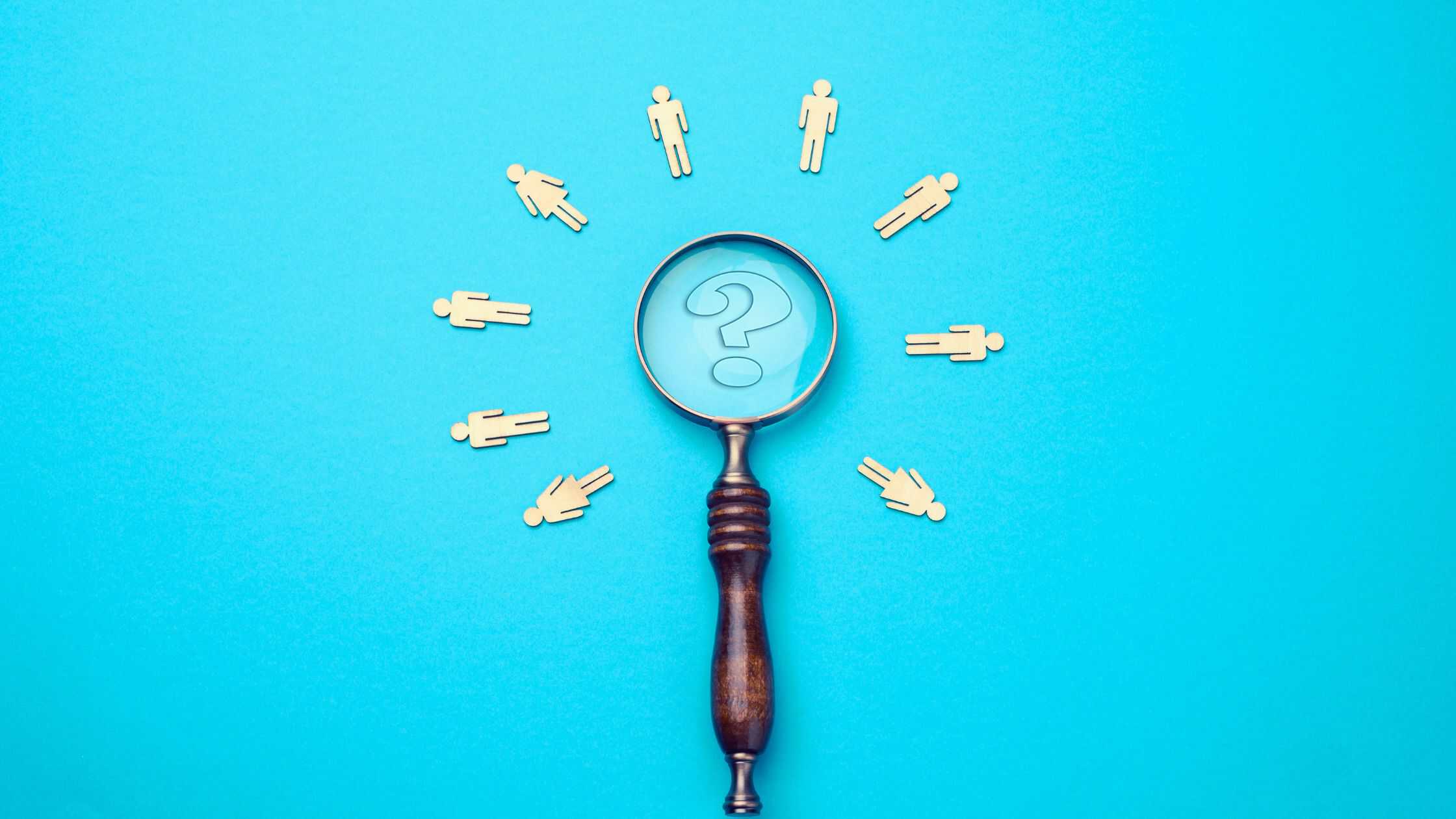 recession-proof customers - a magnifying glass on blue background with people icons surrounding it