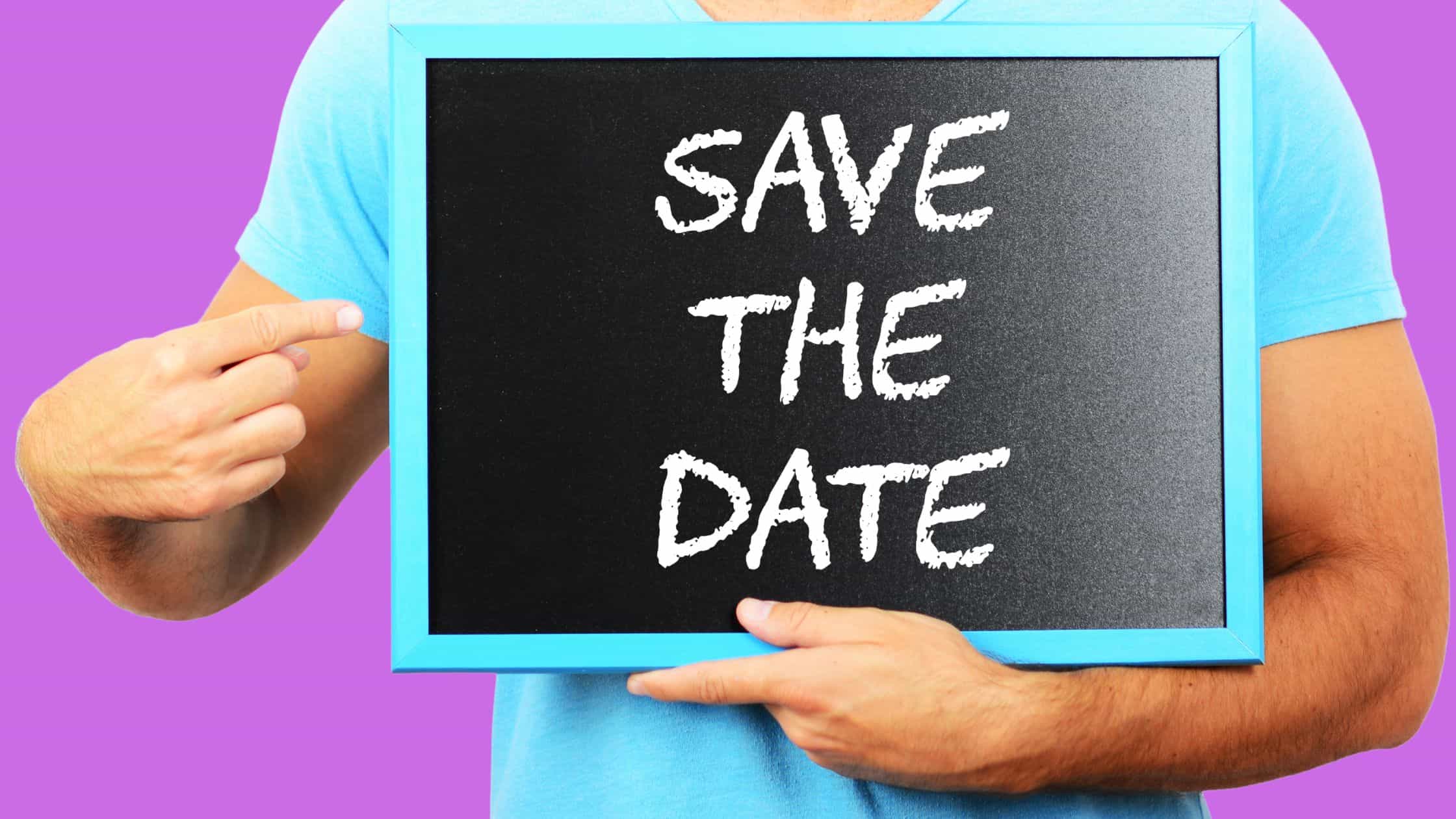 in-person event ideas for small business - man holding save the date sign