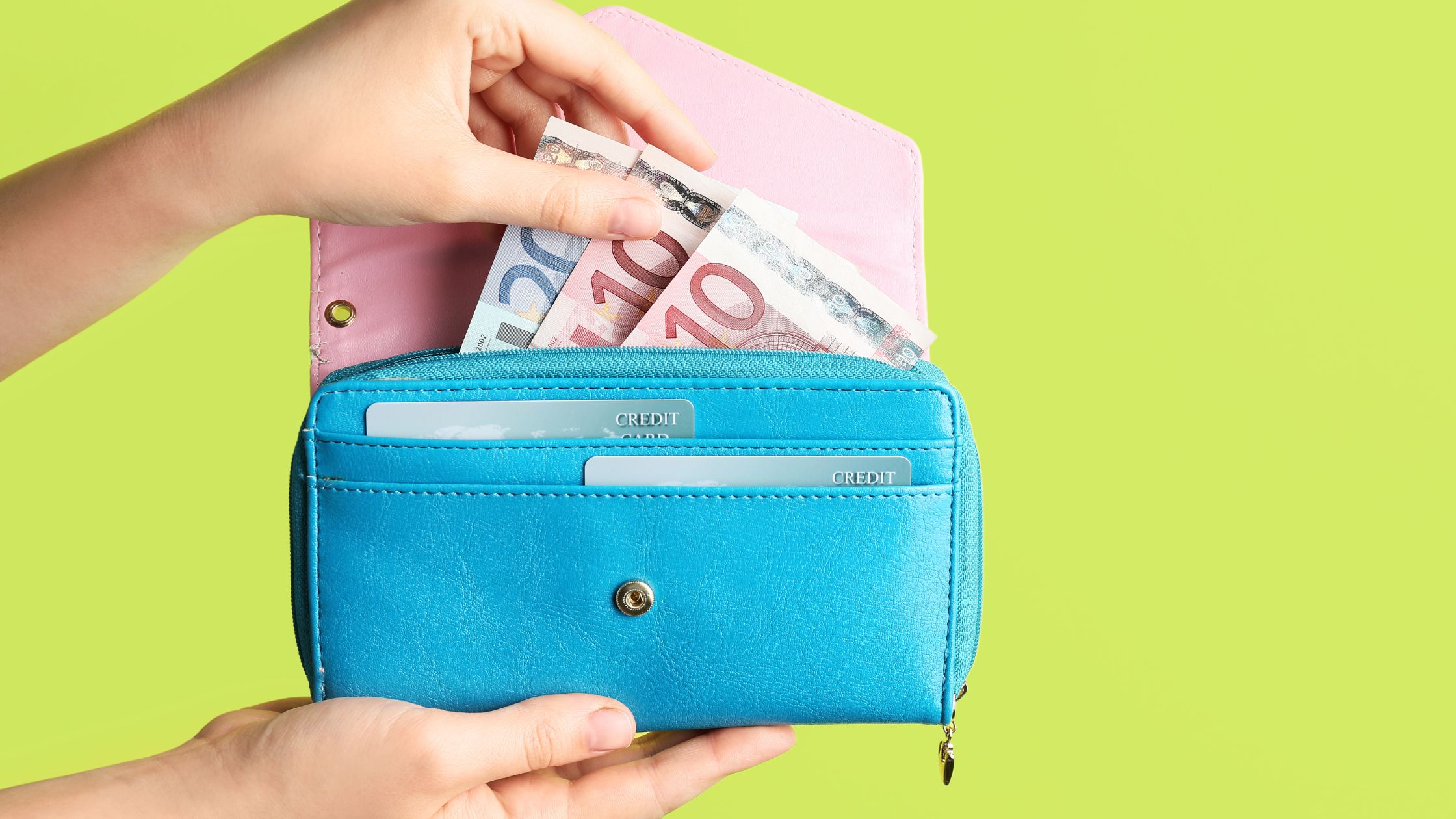 low cost marketing ideas for small business - Hands holding wallet with cash