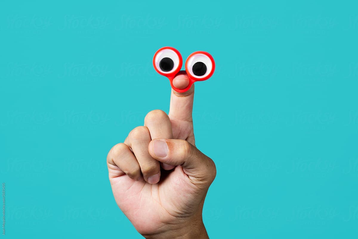 Googly-eyed finger puppet symbolizing fun in improving NPS and Net Promoter Score.