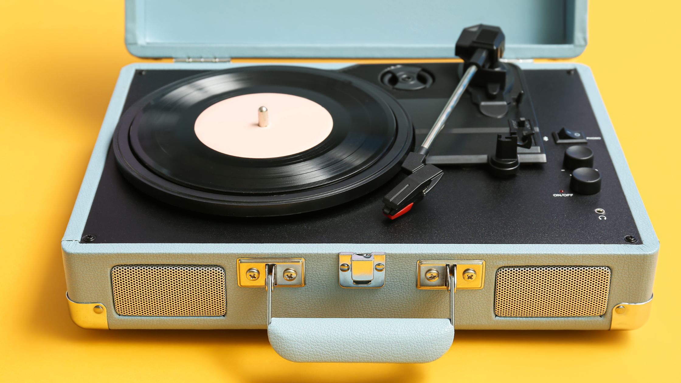 offline marketing strategies for small business Vintage record player on yellow background