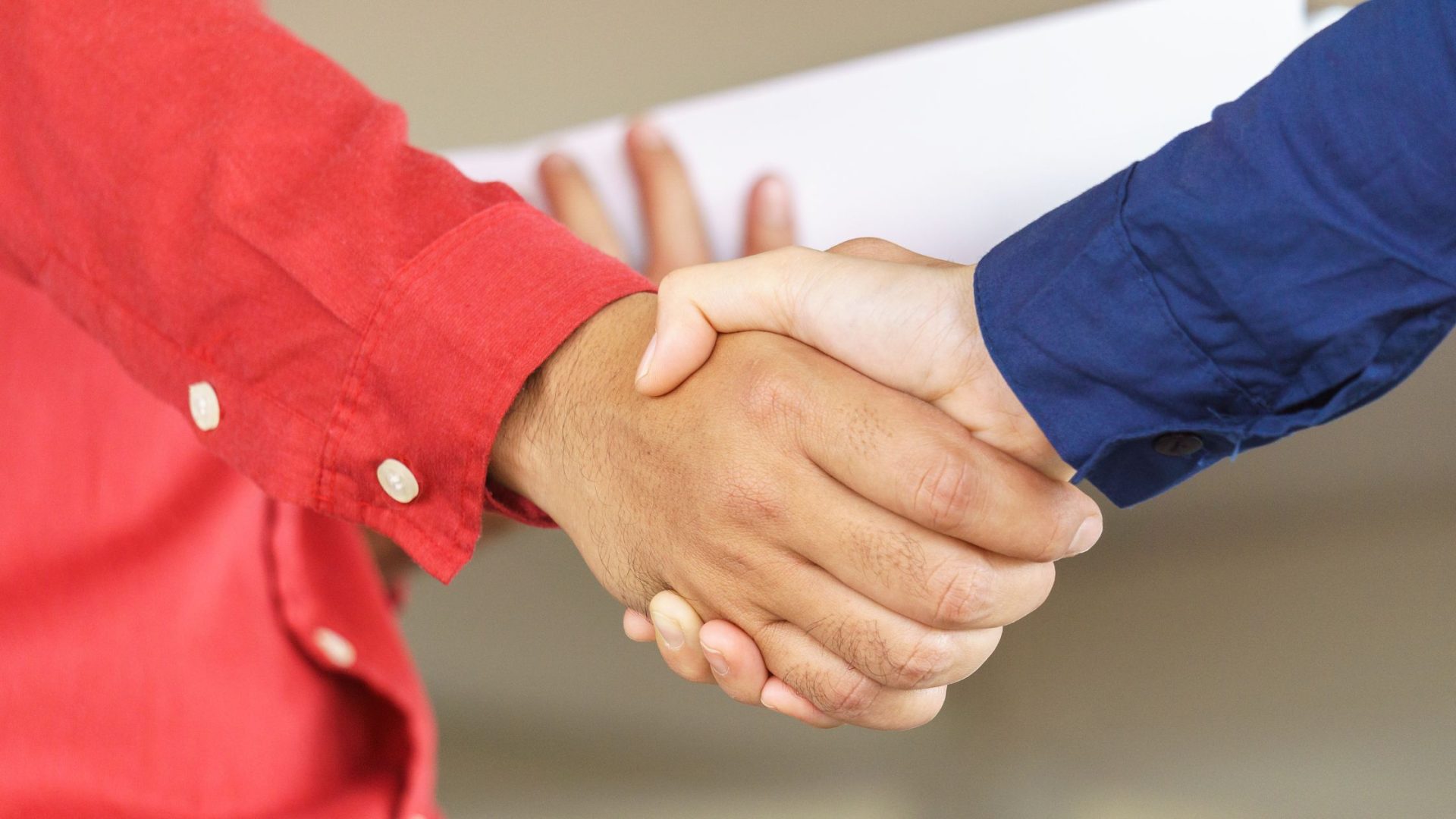 referrals vs references - men shaking hands