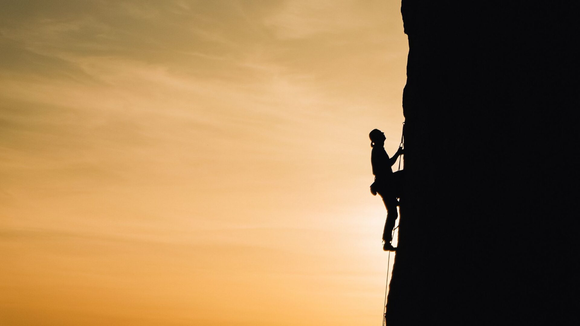 woman climbing mountain mindset